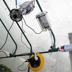How to kee p a greenhouse cool in the desert and hot summer feature image-min