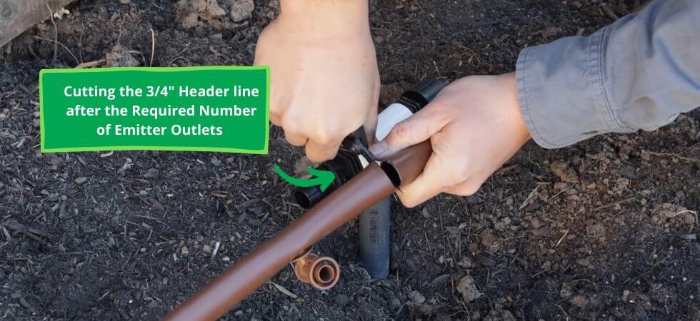 cutting the header line and then connecting it to the main water supply line